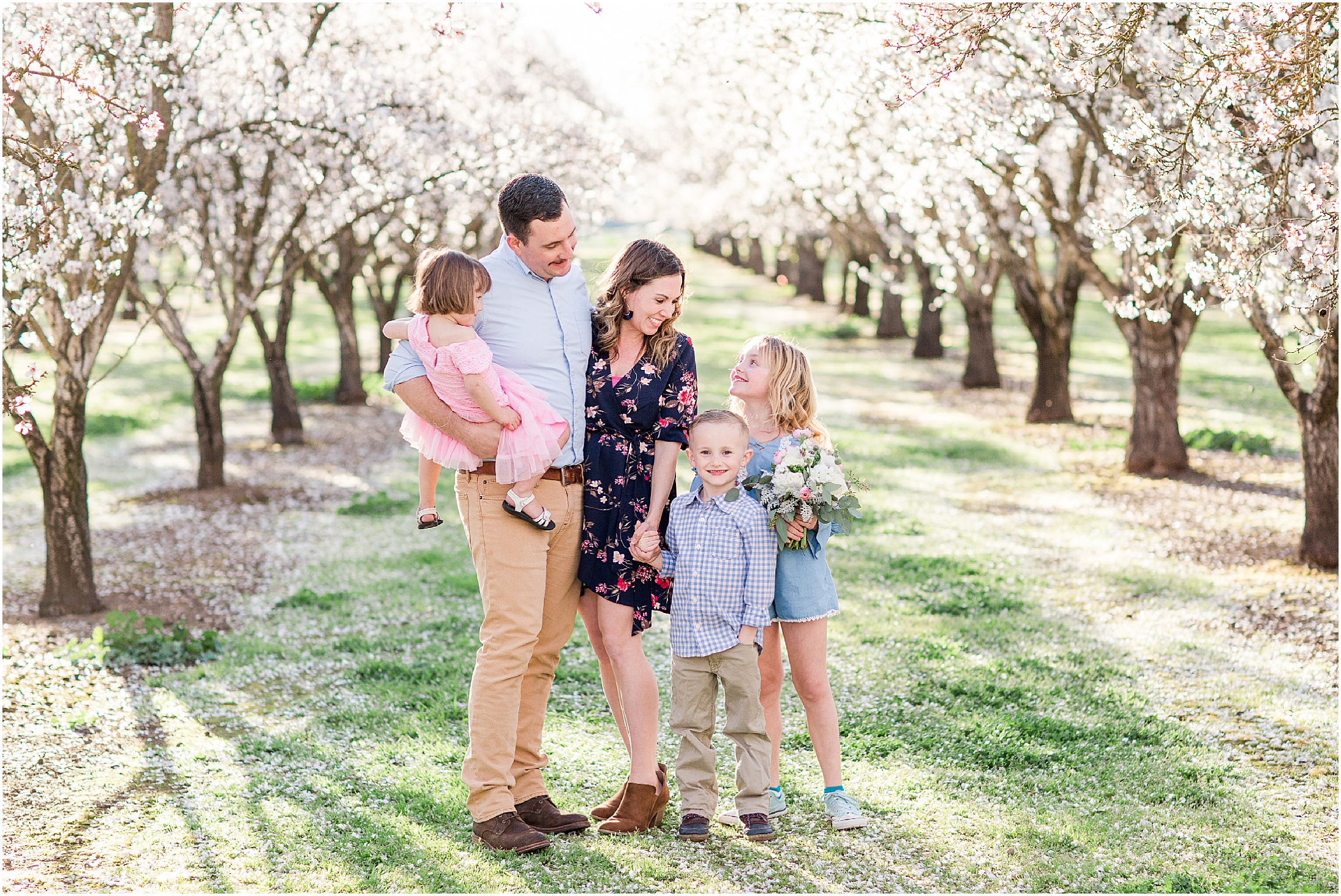 Spring almond blossoms family session in neutrals