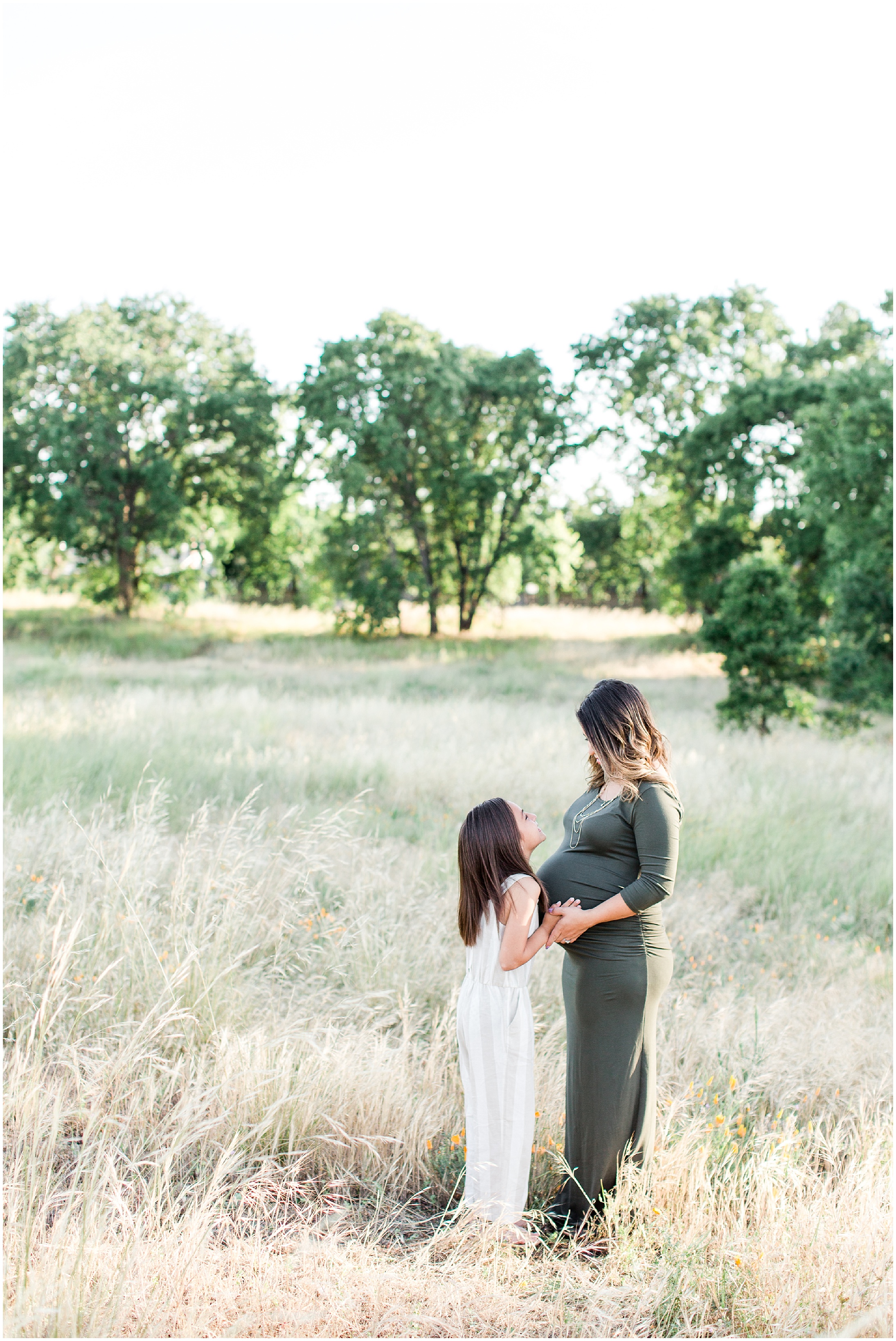 Grassy Fields Maternity Pictures with Daughter