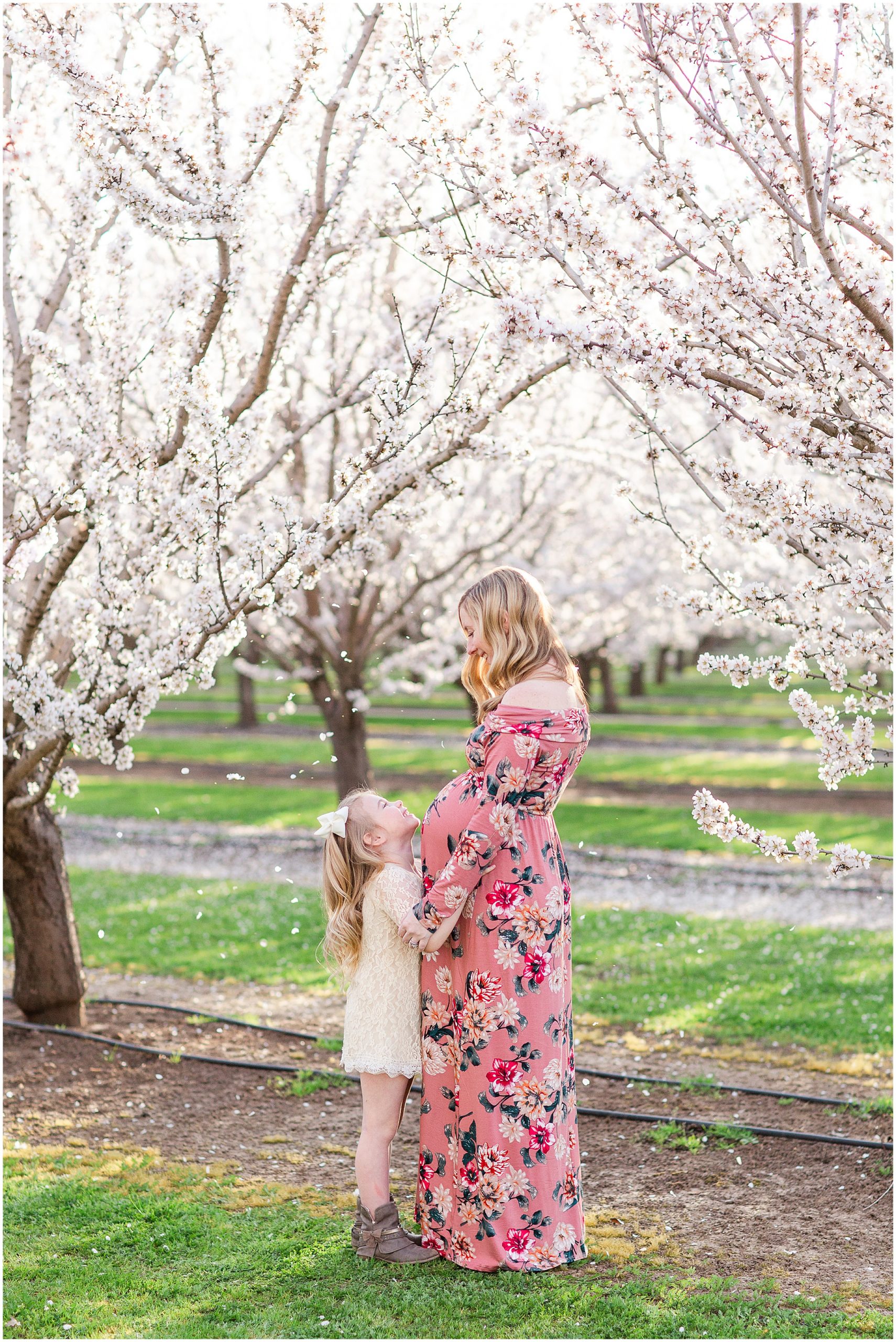Blossoms Falling on Mom and Big Sister | Sammy + Aden Maternity