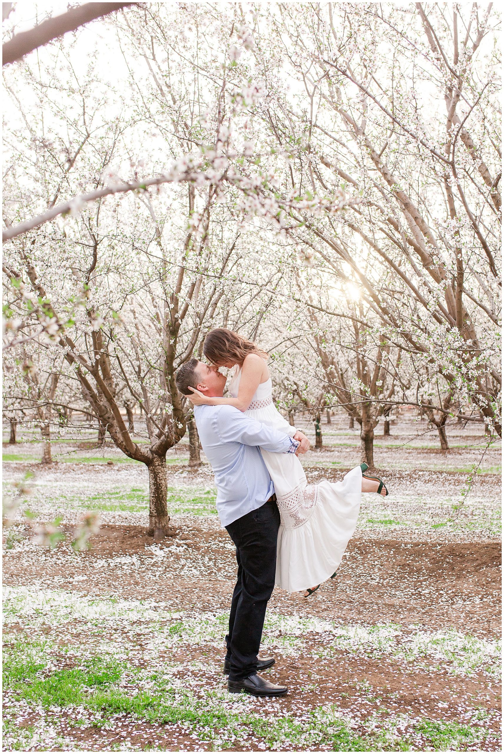 Lifting in the Almond Orchard | Sunshine + Darin