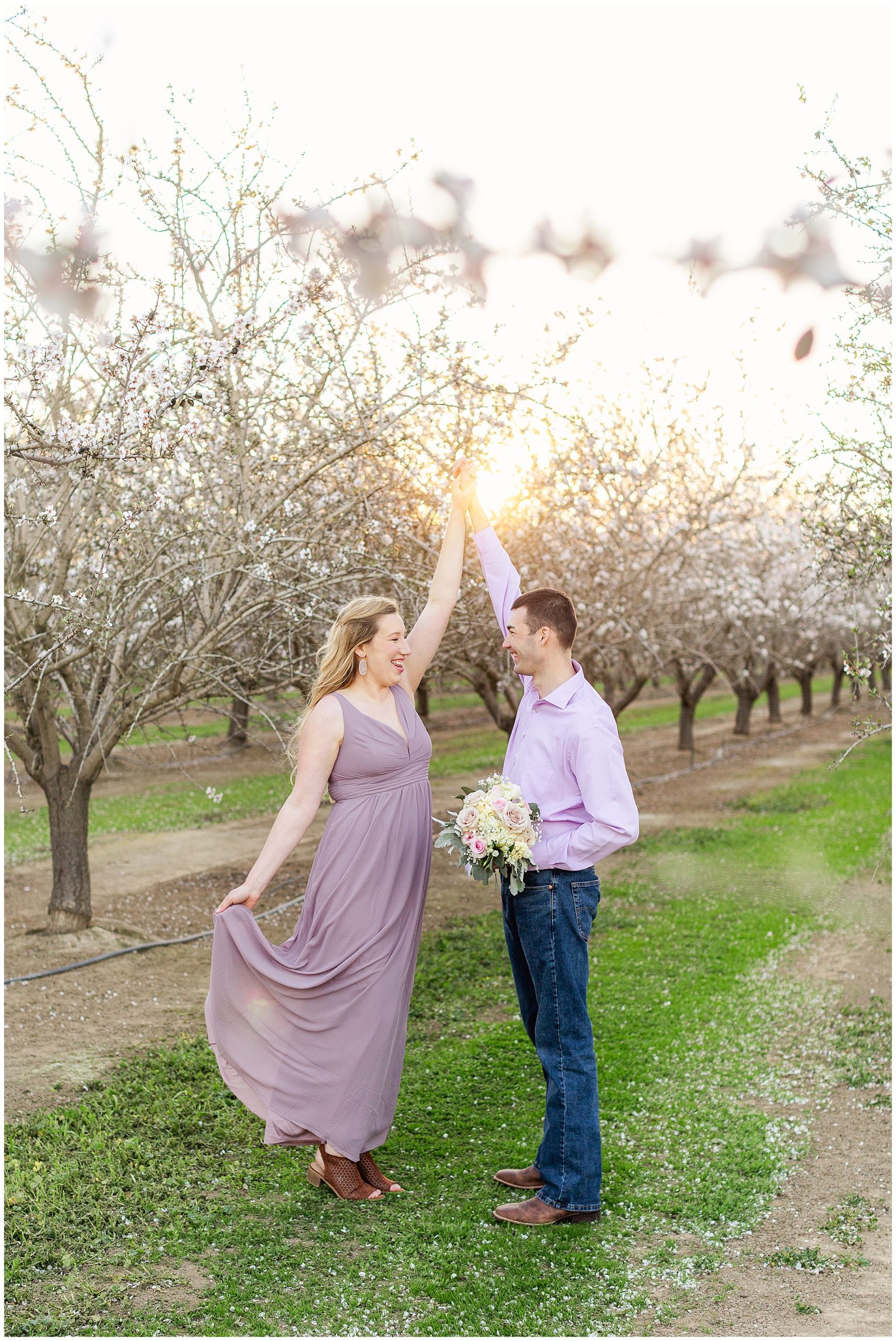 Twirling in the almond blossoms | Andrea + Jason