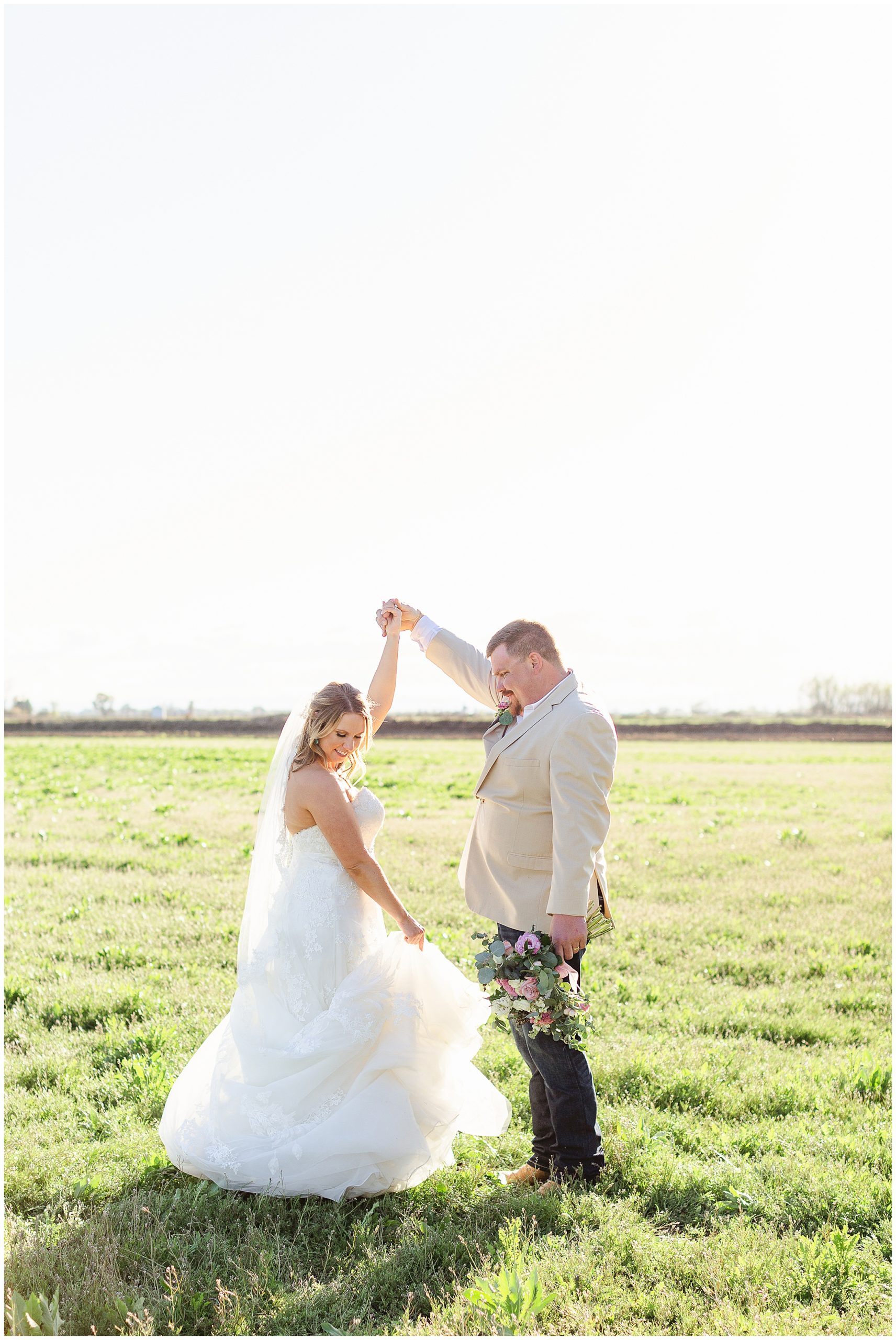 Spring Country Wedding Twirling in Field | Shay + Matt