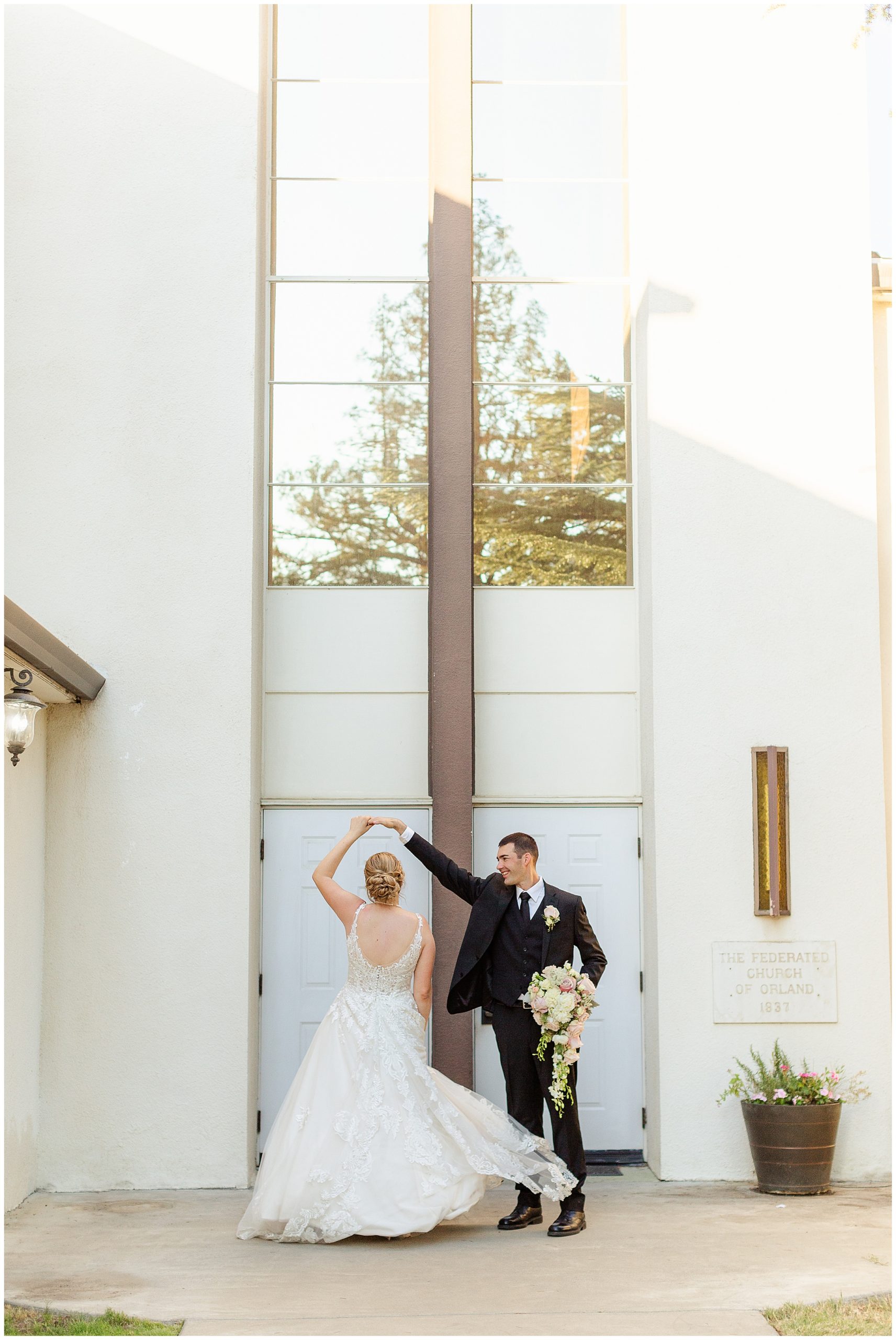 Twirling outside the church doors | Andrea and Jason