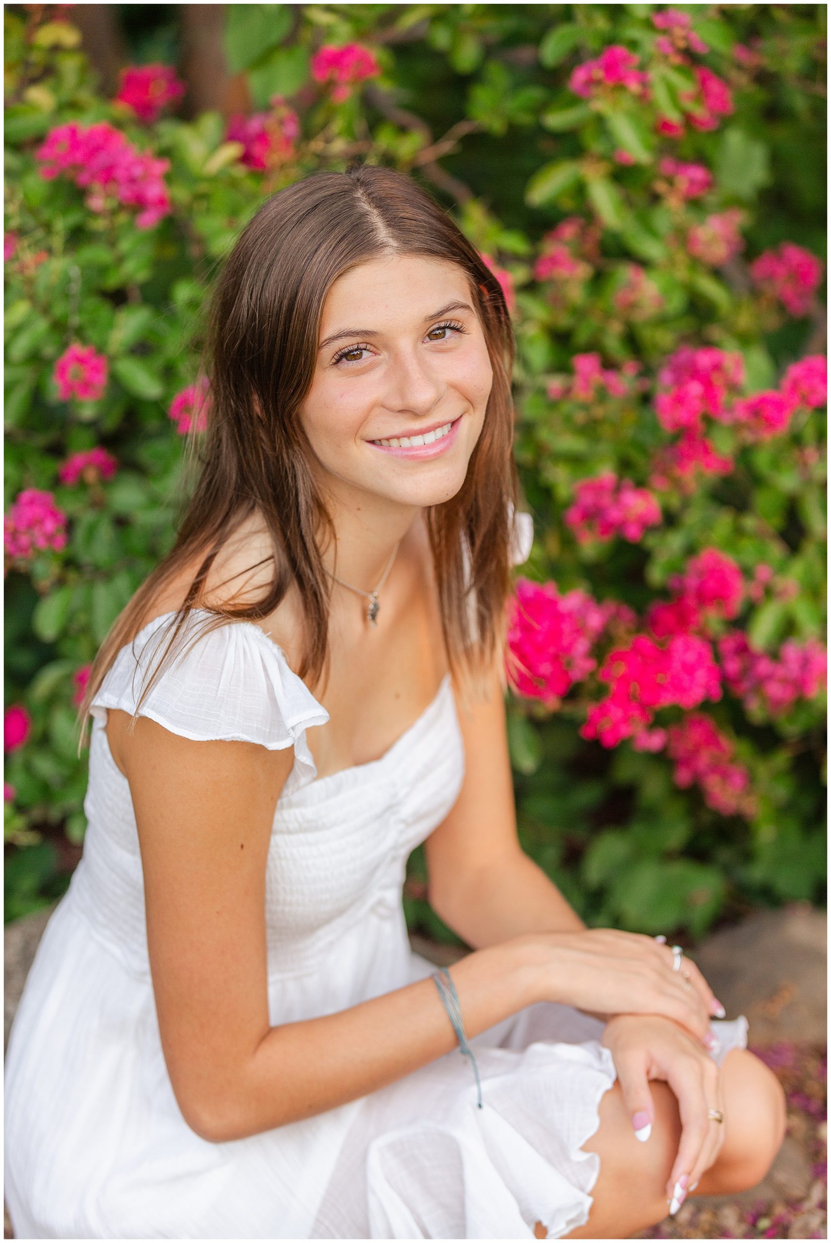 High School Senior Portraits at White Ranch Events with Pink Flower | Senior Molly