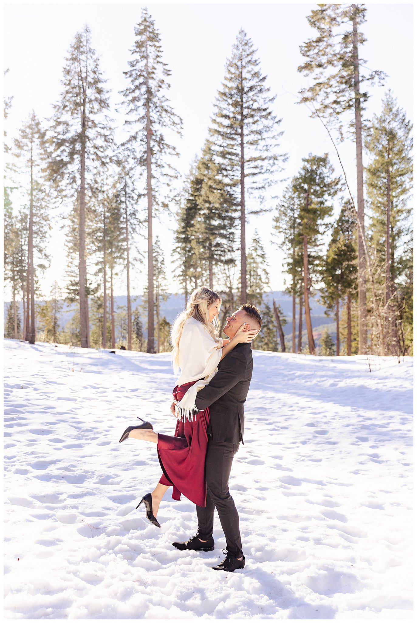 Formal Snowy Engagement Session with Red Dress and Black Jacket | Svetlana + Brett