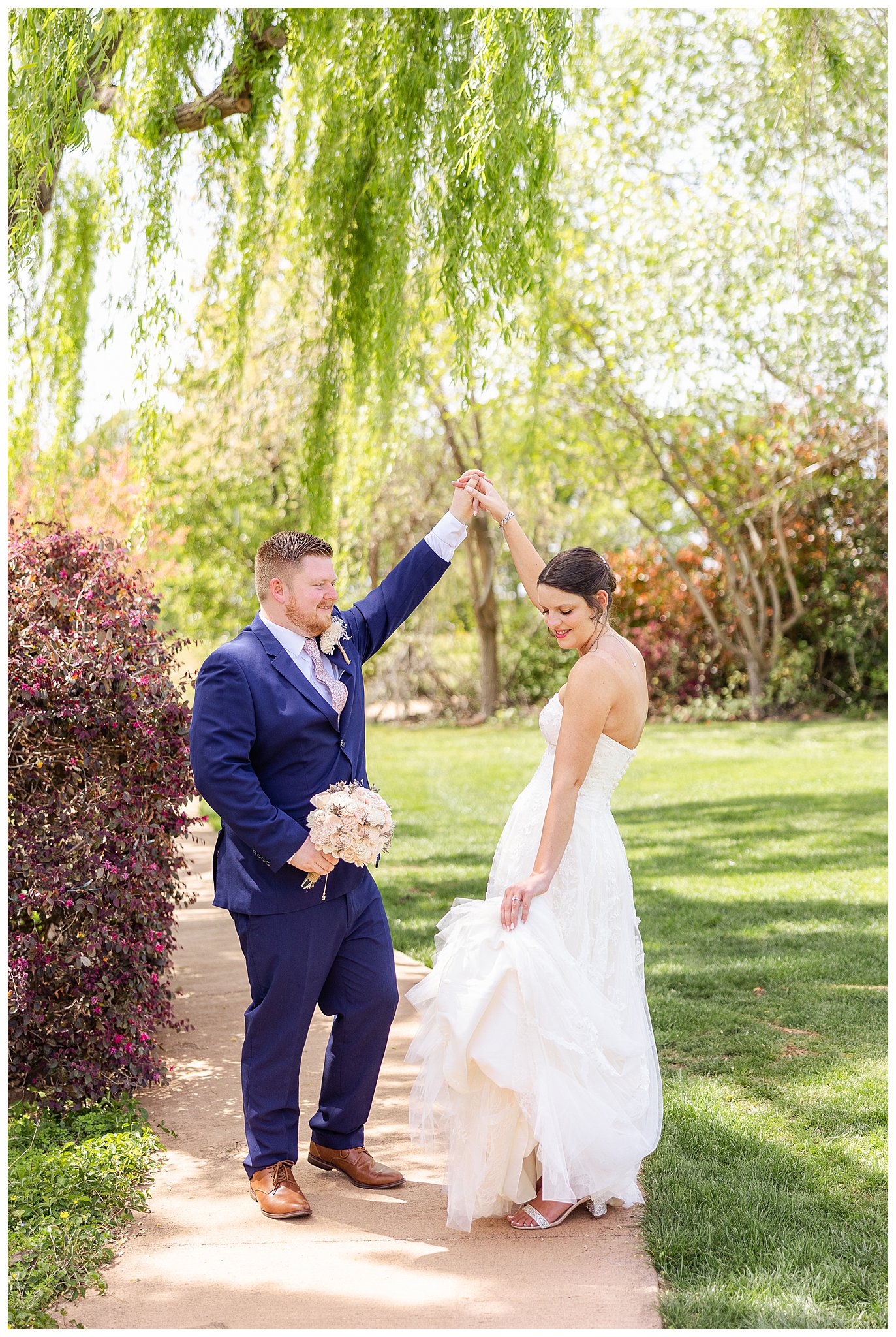 White Ranch Events Twirling Under Willow Tree | Meagan + Andrew