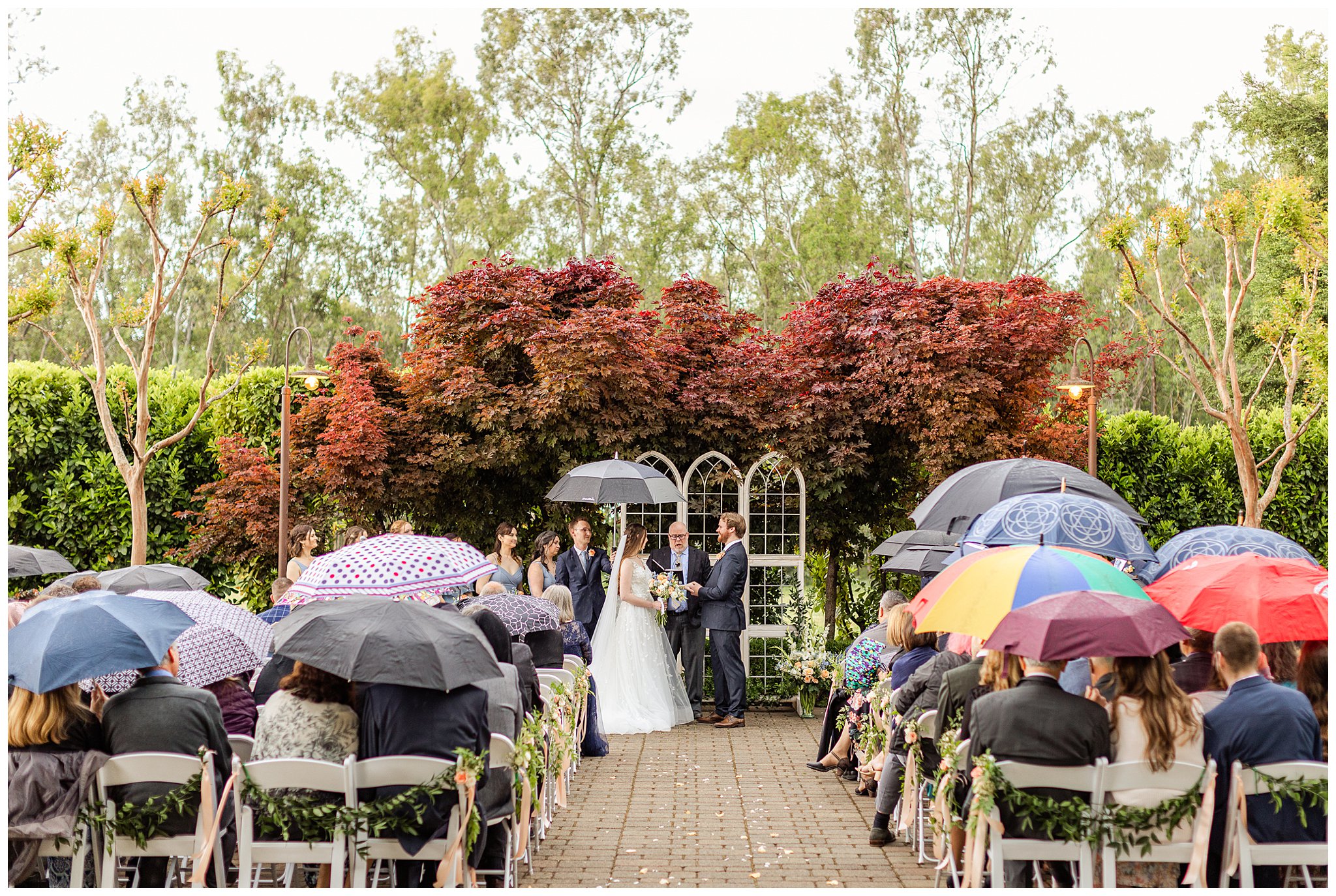 Irongate Garden Inn Wedding Chico CA Spring May Rain Tent First Look Shale Blue Navy Pastel Floral Bouquet Cathedral Window Altar,
